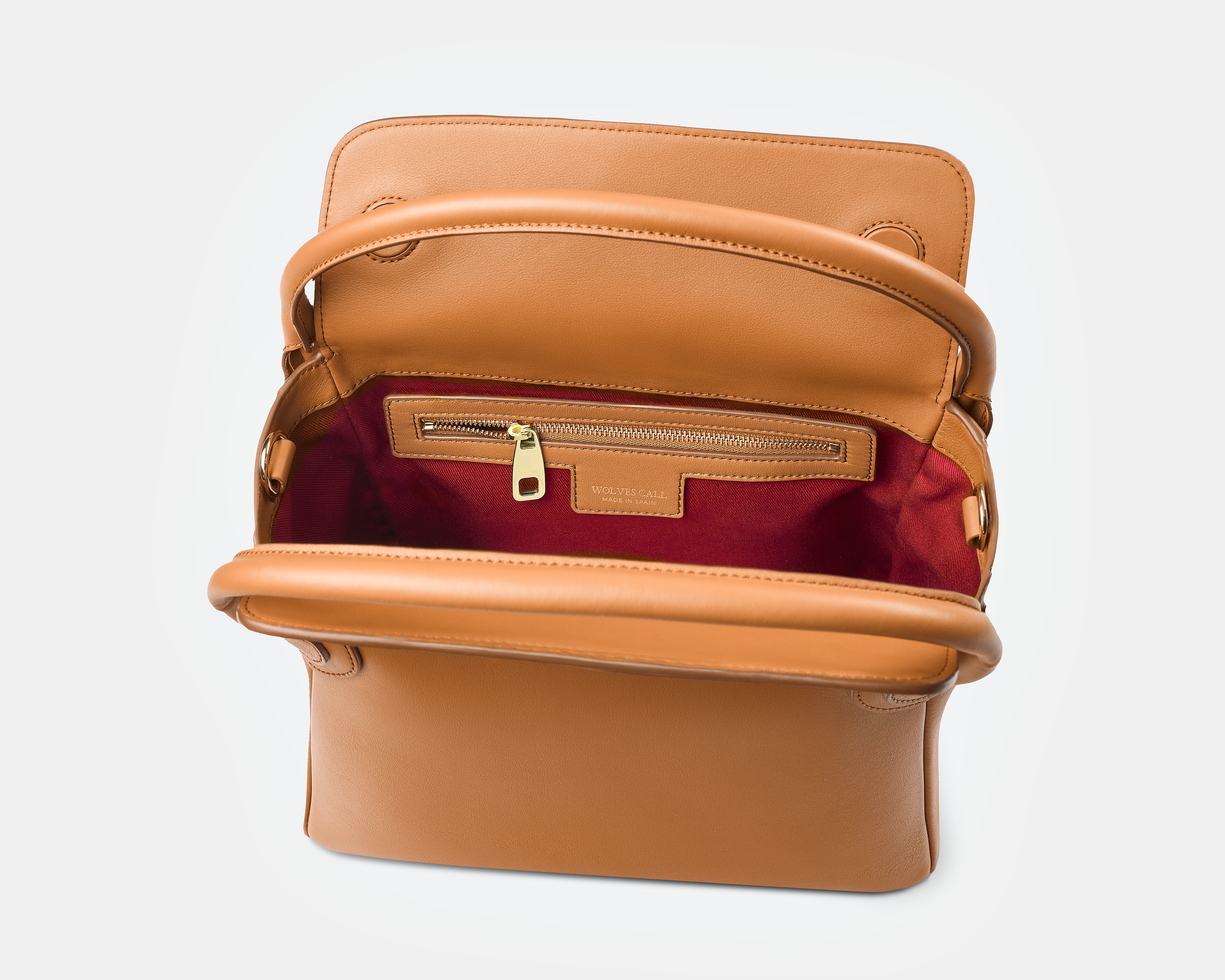 Wolves Call 'The Maria' handbag in tan, open showing the red satin lining